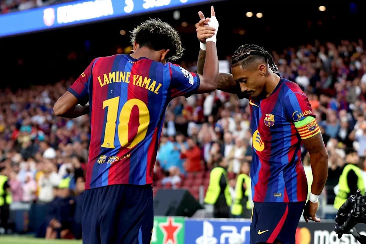Lamine Yamal celebrating a goal with teammate