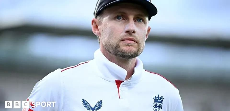 Cricketer in England kit looking focused