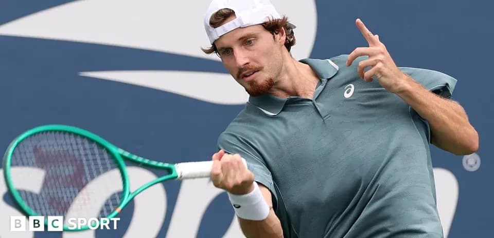Player hitting a tennis ball during match