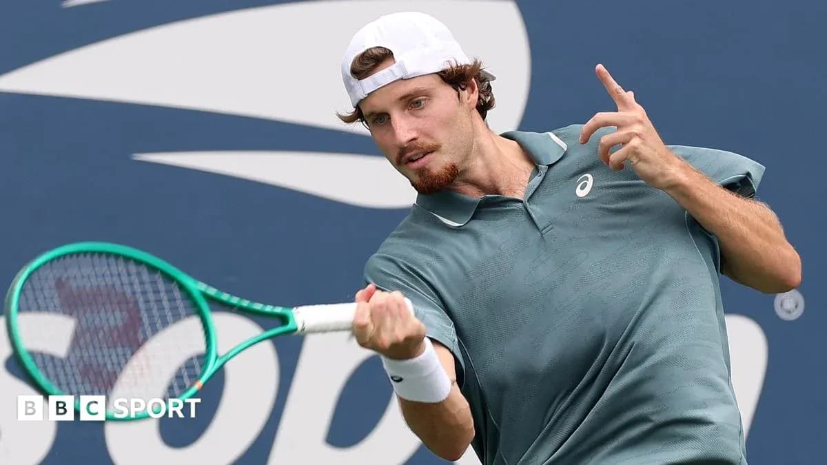 Player hitting a tennis ball during match