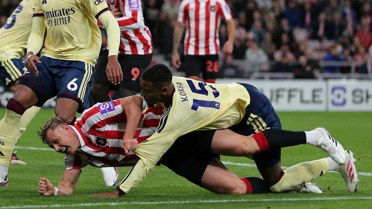 Players competing on the ground during a match Players competing on the ground during a match