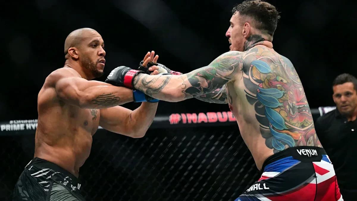 Two fighters exchanging punches in MMA match
