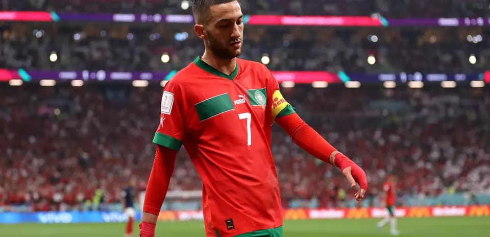 Player walking off the field in Morocco kit