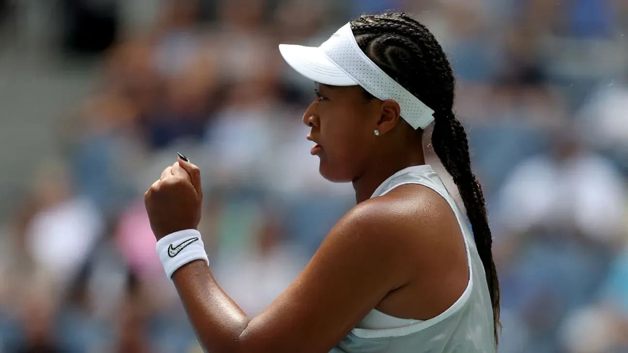 Tennis player celebrating a point during match