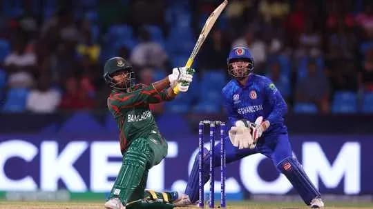 Batsman hitting the ball during cricket match