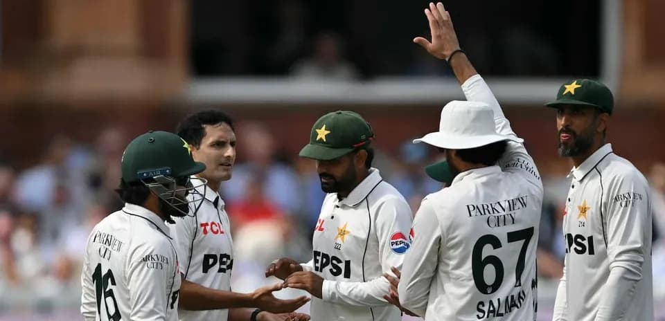 Pakistan cricket team celebrating a wicket on field