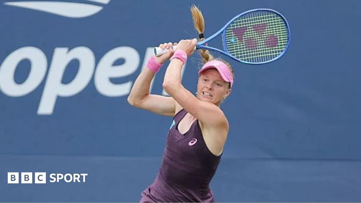 Player hitting a tennis ball during a match