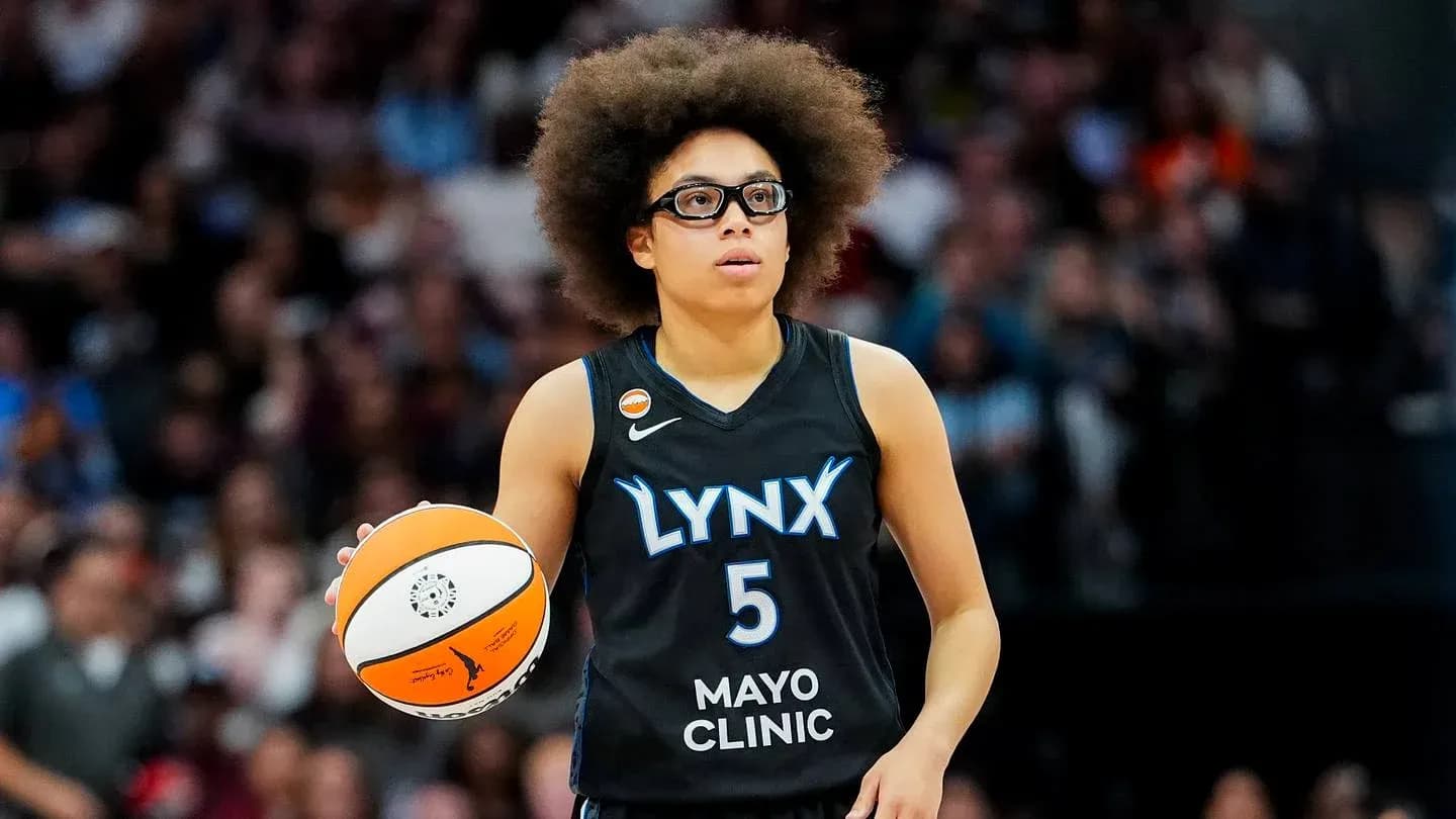 Player from Lynx holding basketball during game