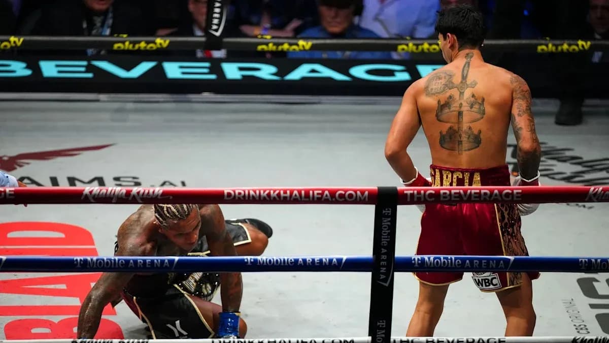 Boxer on the canvas during a championship match