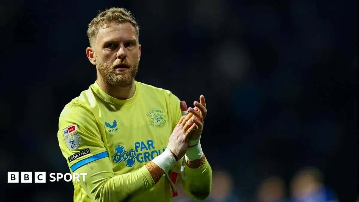 Goalkeeper clapping to fans after the match