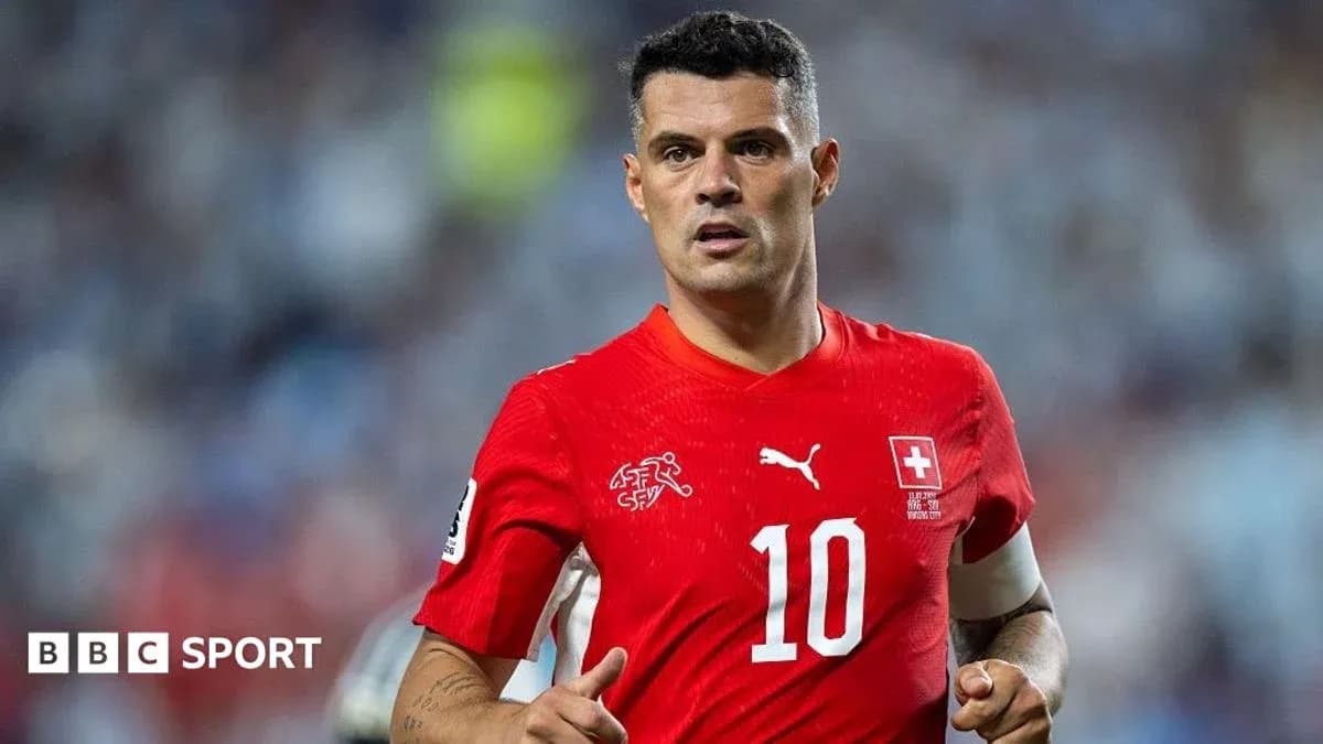 Granit Xhaka in red Switzerland kit on the field