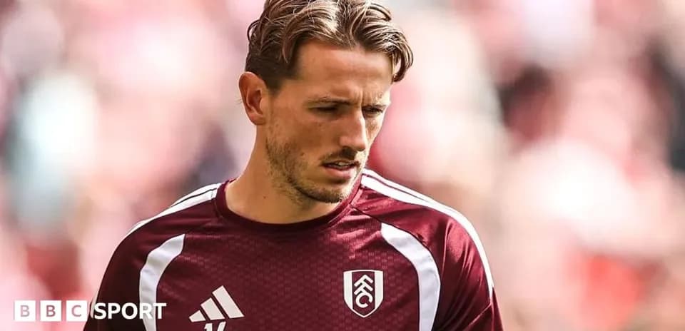 Player wearing Fulham jersey during warm-up