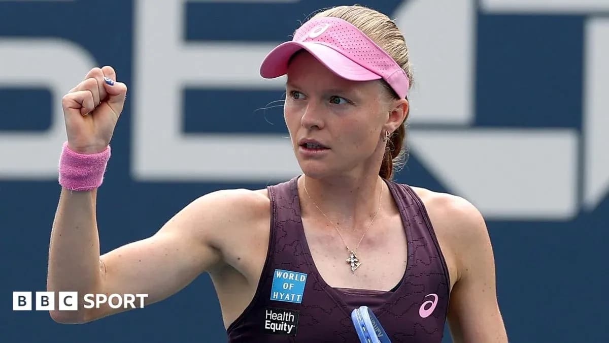 Tennis player celebrating with raised fist during match