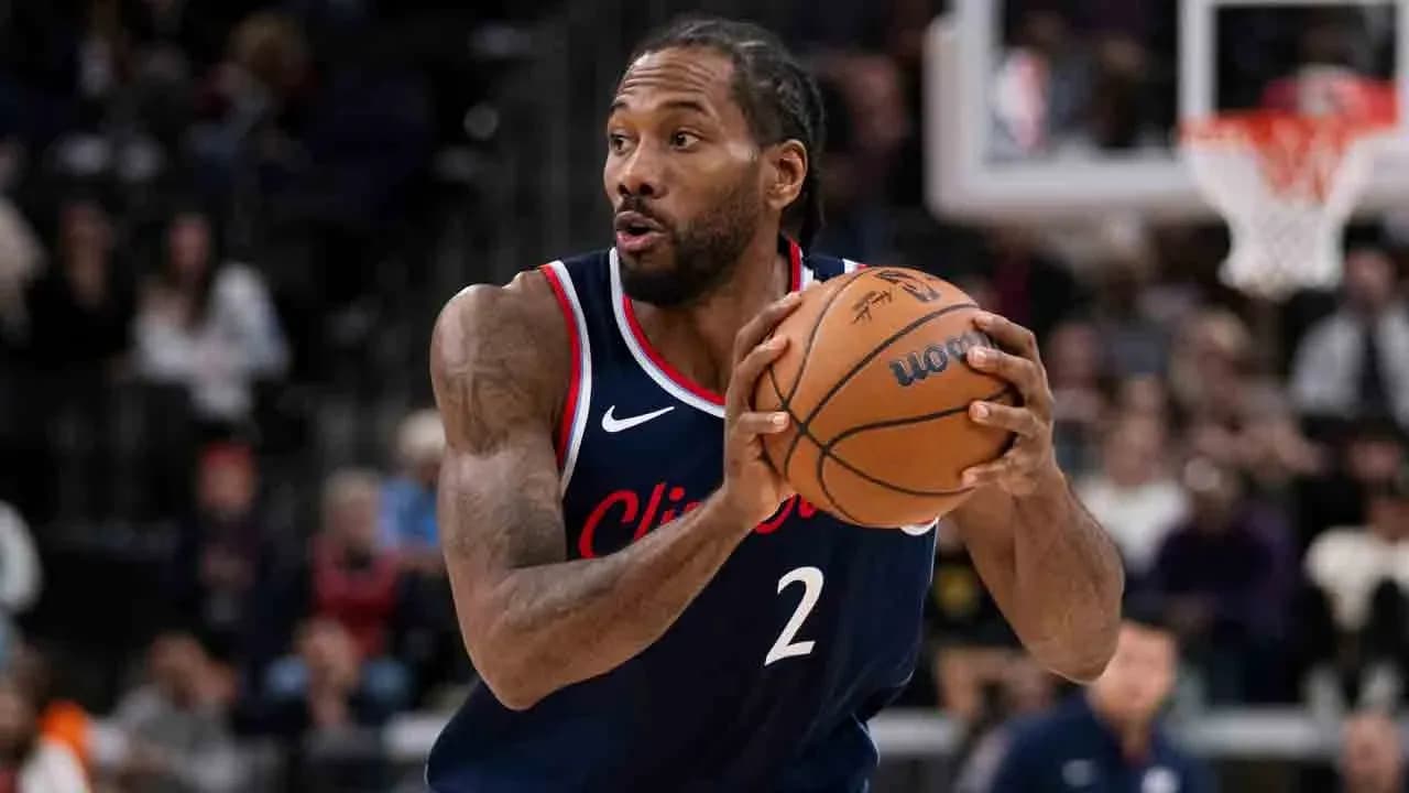 Player dribbling basketball during game action