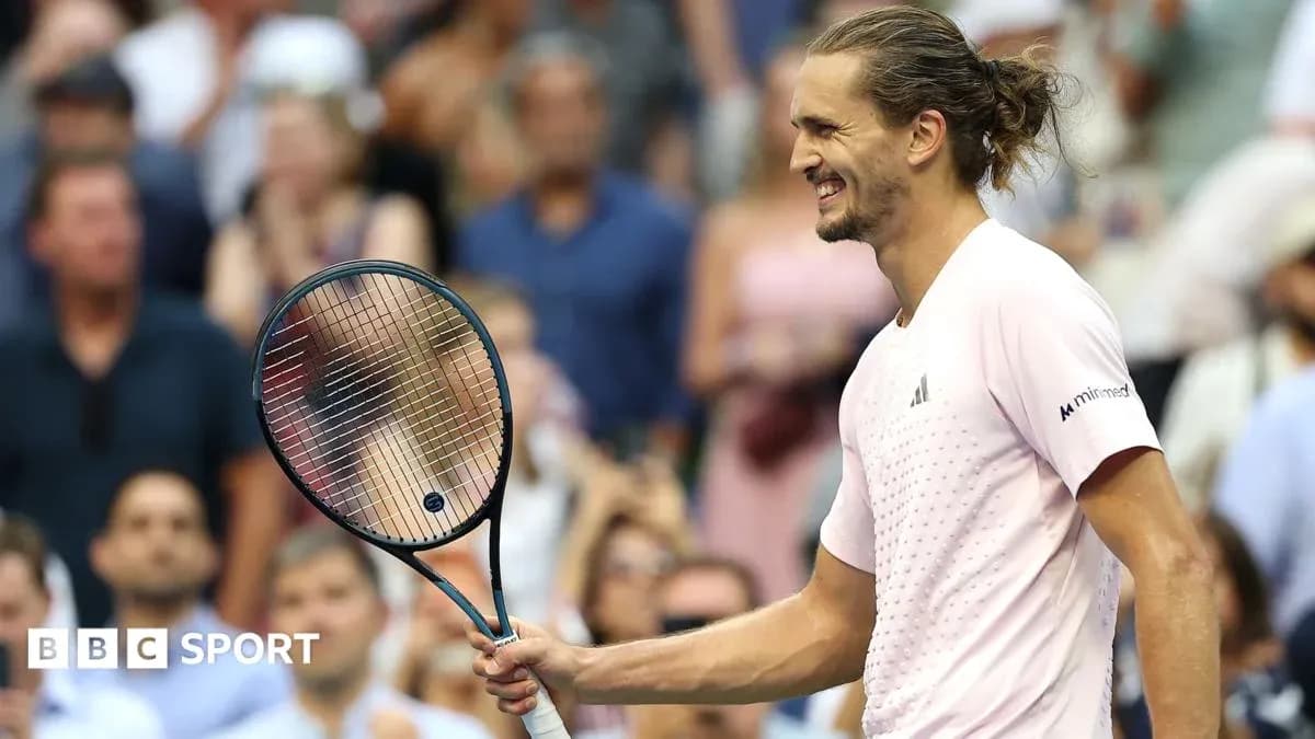 Tennis player celebrating with racket in hand