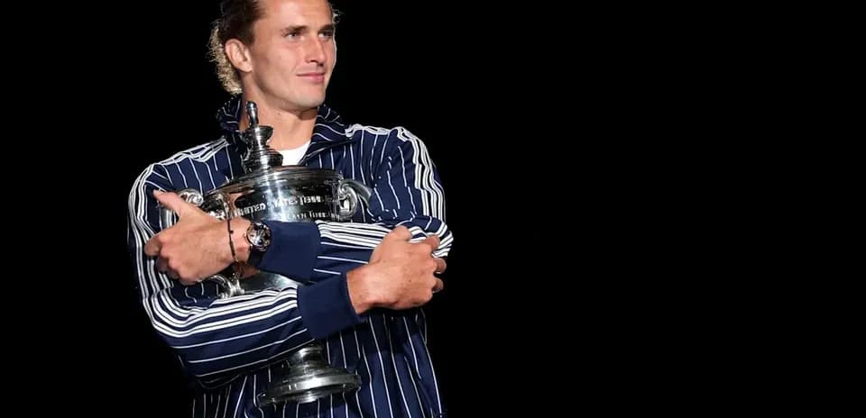 Player holding trophy after winning championship
