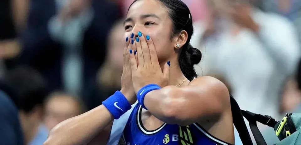 Player celebrating with hands on face after victory