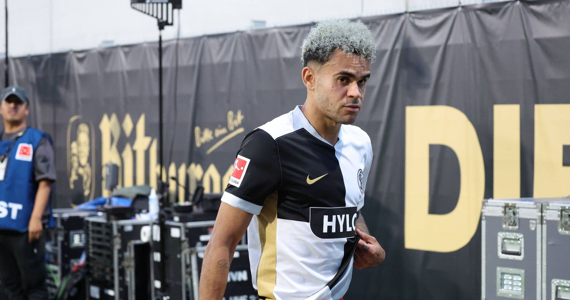 Player walking off the pitch after match