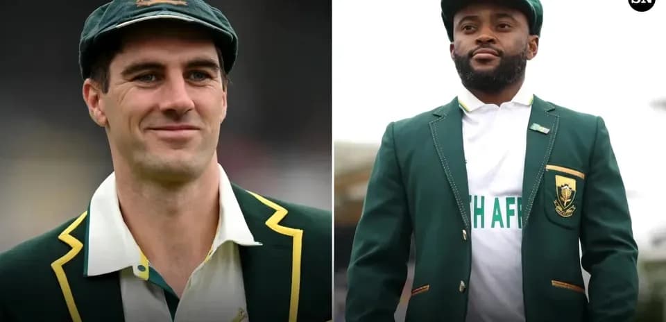 Two cricketers in national team blazers posing together