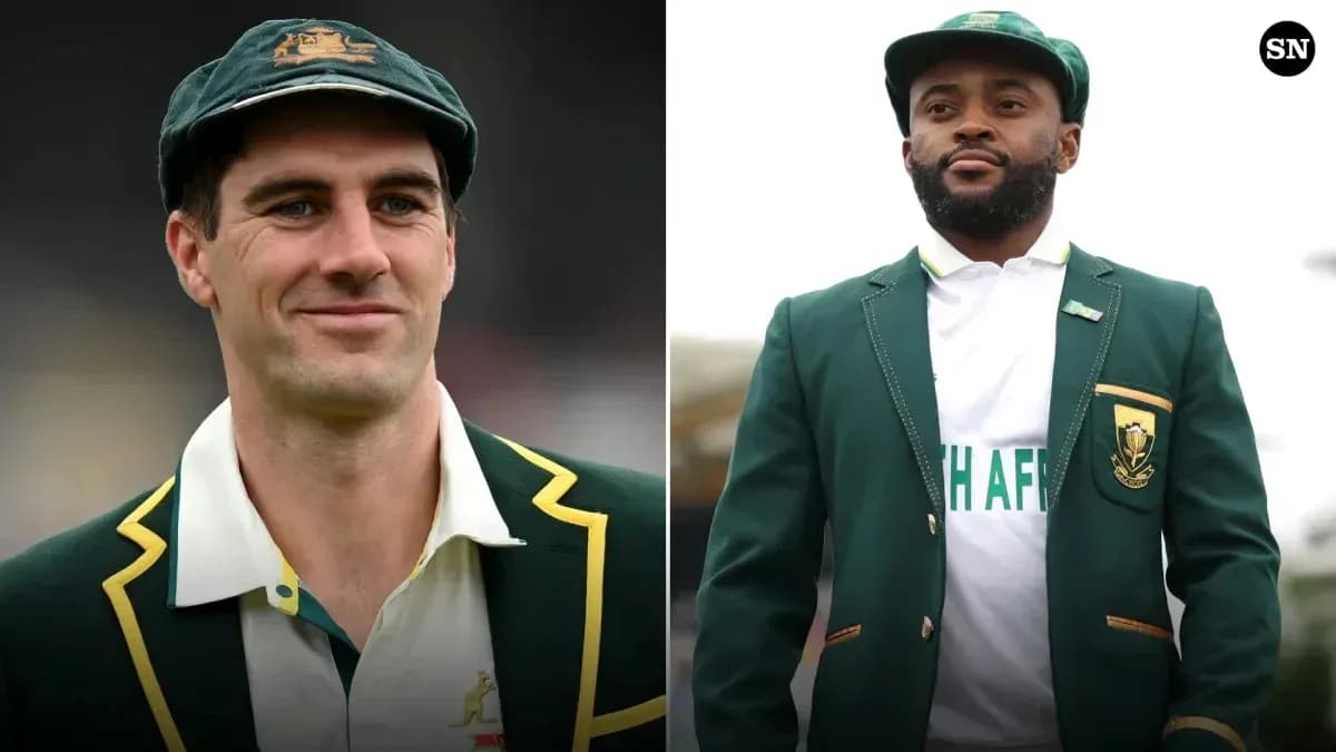 Two cricketers in national team blazers posing together