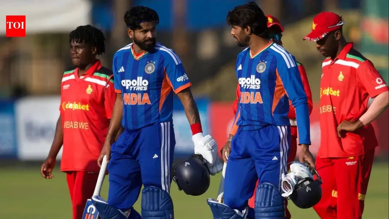Indian cricketers walking off field after match
