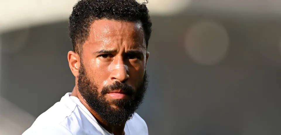 Player with beard and bandage on nose during training