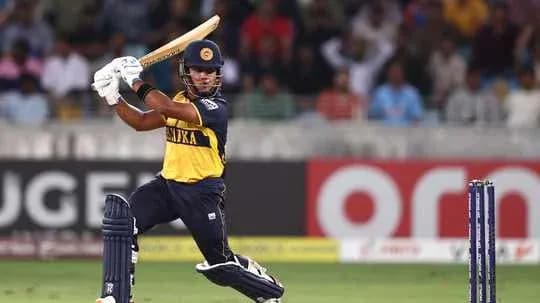 Batsman playing a shot during cricket match