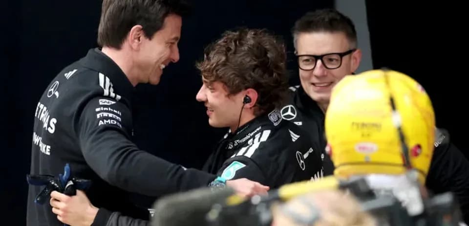 Team members celebrating after a race victory