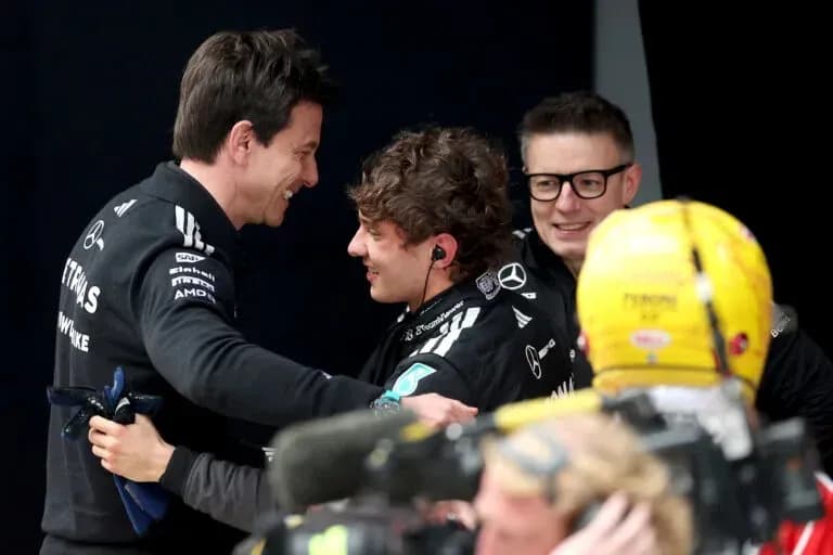 Team members celebrating after a race victory
