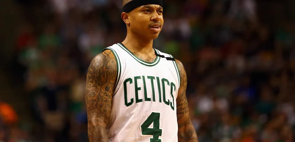 Basketball player in Celtics jersey on court