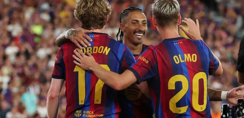 Players celebrating together after scoring a goal