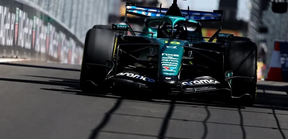 Aston Martin Formula 1 car racing on track