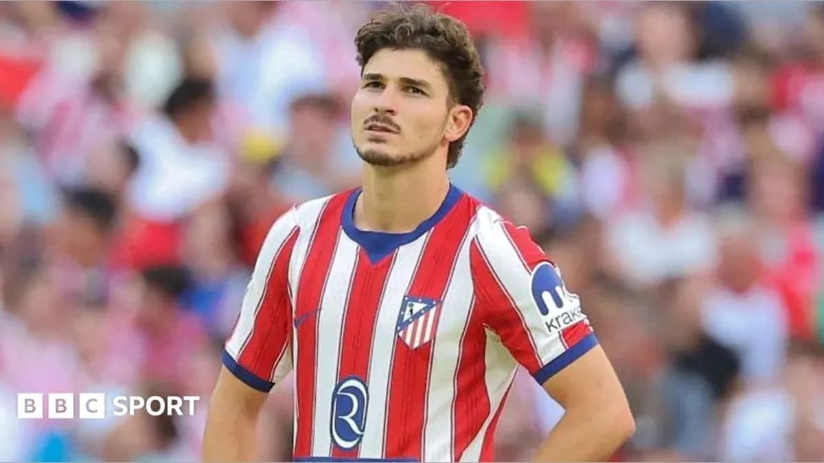 Player in Atlético Madrid jersey during match