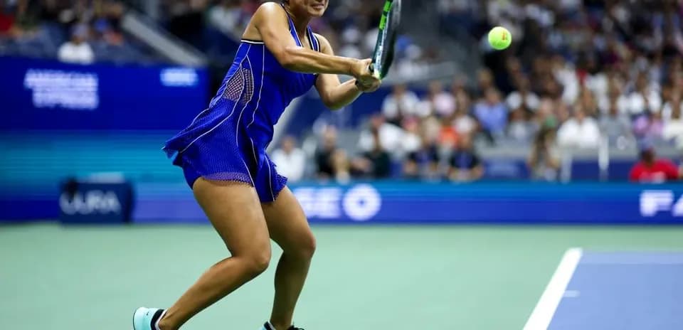 Player hitting a forehand during tennis match