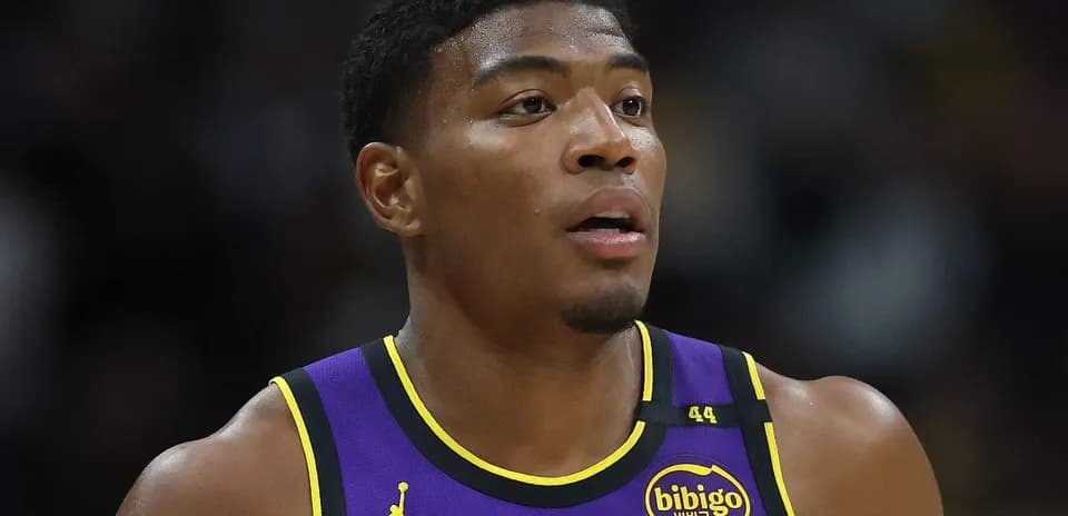 Player in Lakers jersey during basketball game