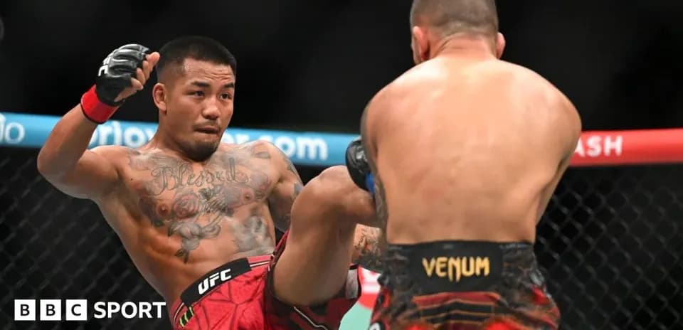 Fighter executing a kick during UFC match