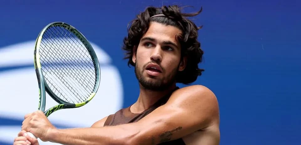 Tennis player preparing to hit a shot