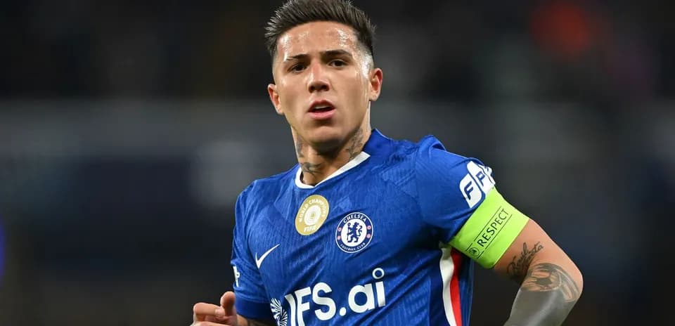 Player in blue Chelsea jersey with captain's armband