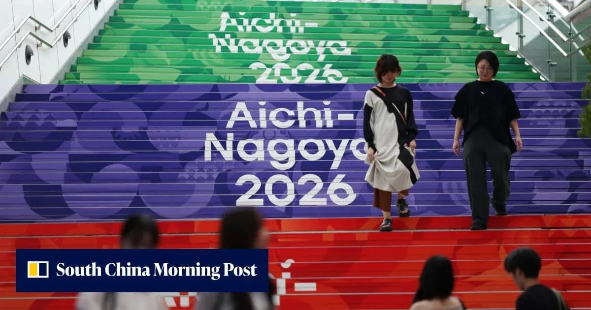 Two women walking down colorful Aichi-Nagoya 2026 steps
