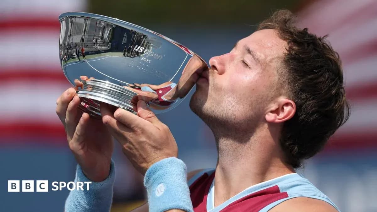 Player kissing US Open trophy after victory