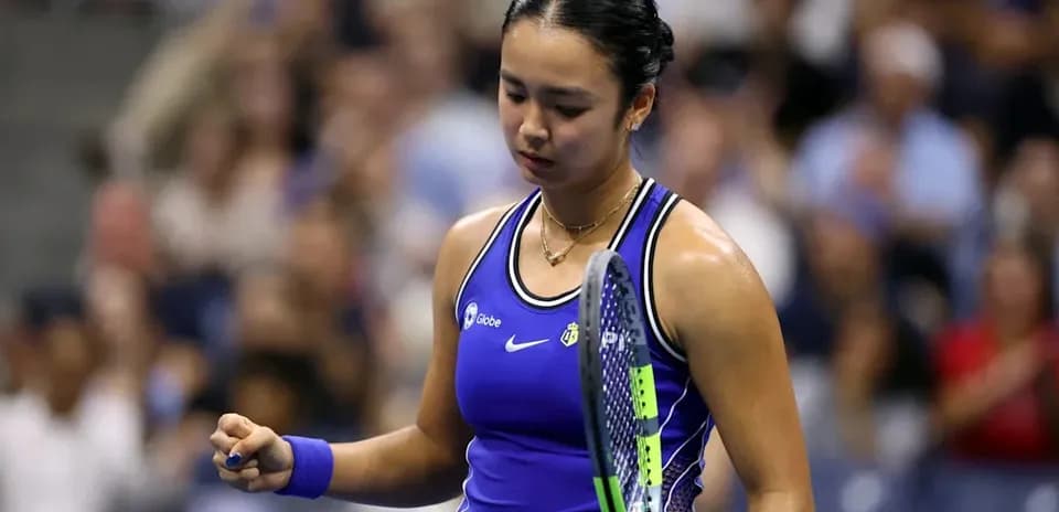 Tennis player celebrating after winning a point