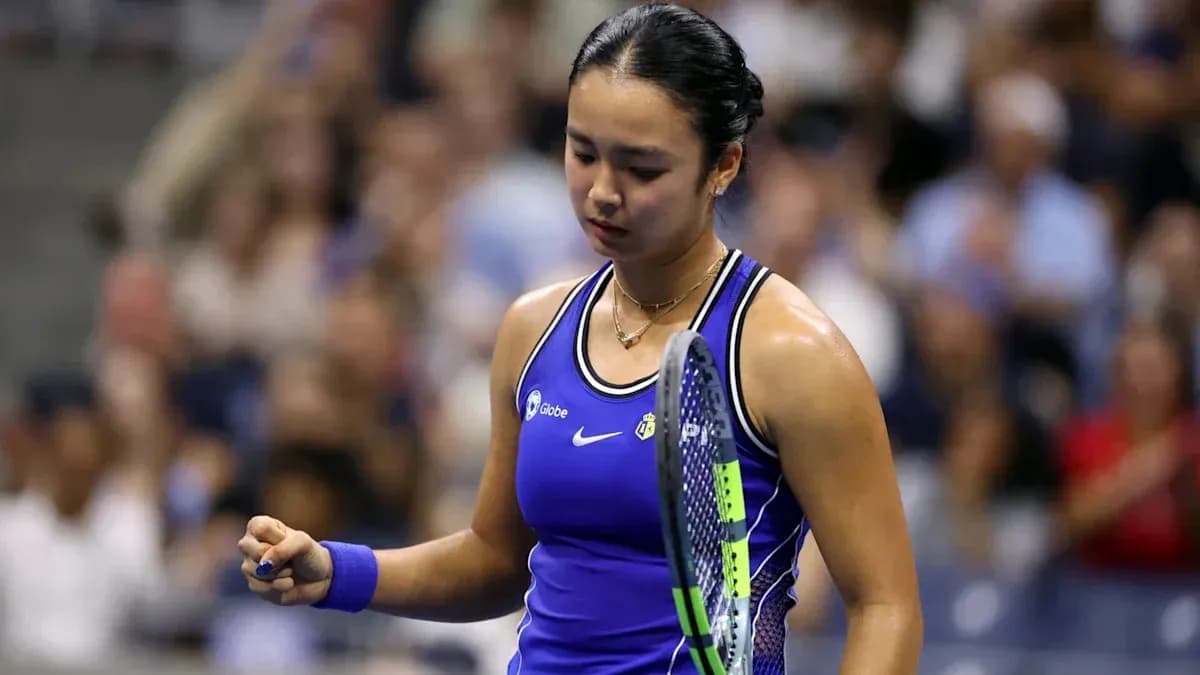 Tennis player celebrating after winning a point
