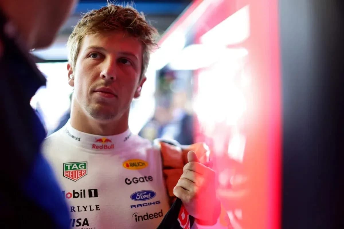 Driver preparing in garage before race event