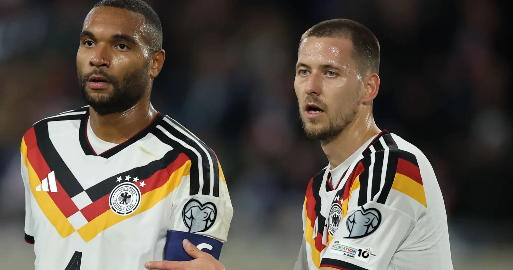Two Germany players during a match discussion