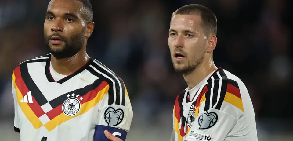 Two Germany players during a match discussion