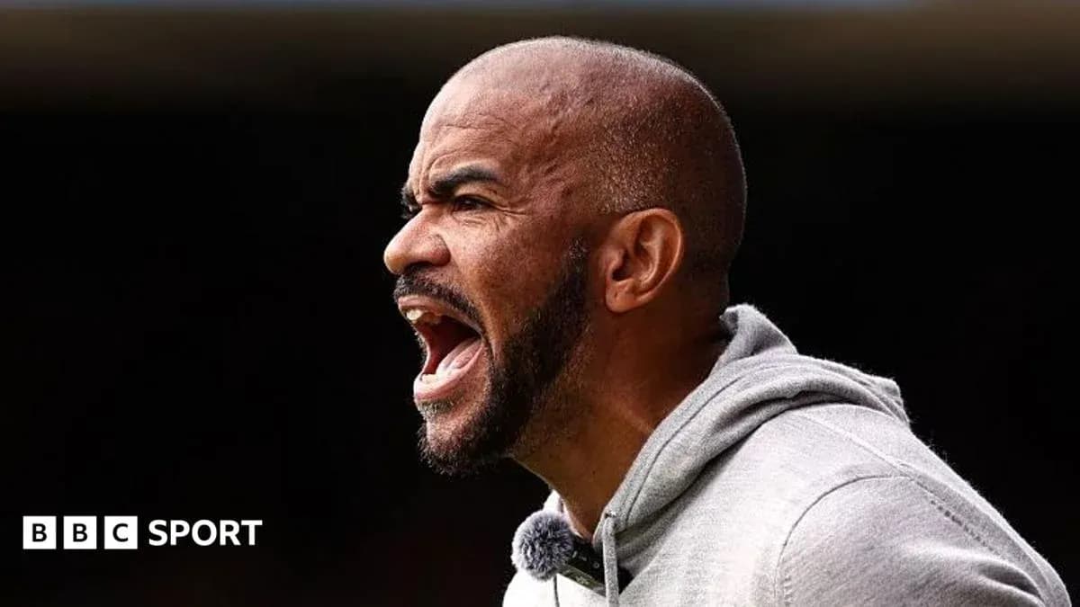 Coach shouting during a football match