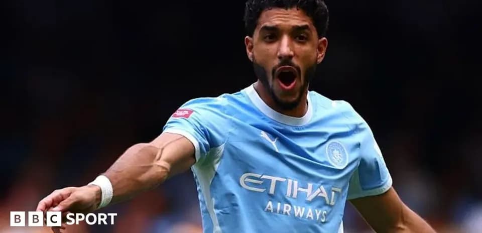 Player celebrating during a Manchester City match