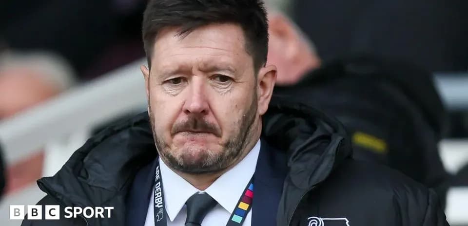 Manager looking concerned during match at stadium