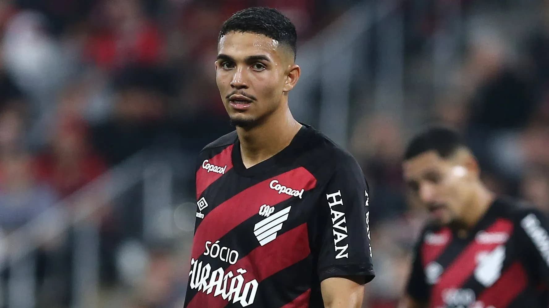 Player wearing Athletico Paranaense jersey on field