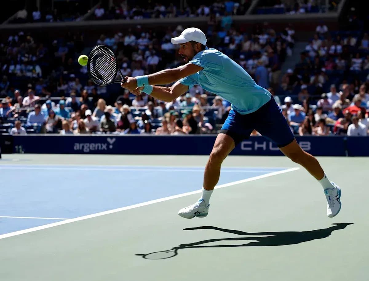 Player returning a shot during tennis match Player returning a shot during tennis match